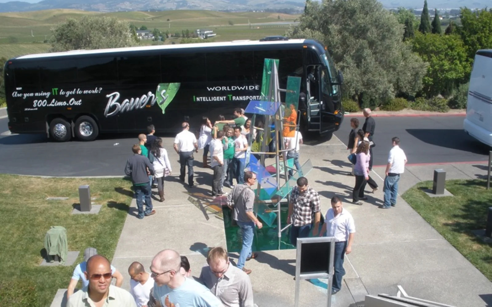 Visitors with a van outside a winery in Napa Valley wine country